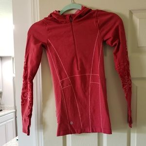 Athleta hooded compression shirt.